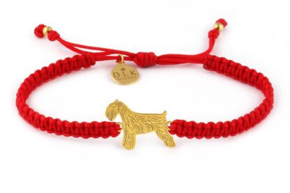 Kolekcja Rasy psów - Bransoletka ze sznaucerem złotym na czerwonej makramie